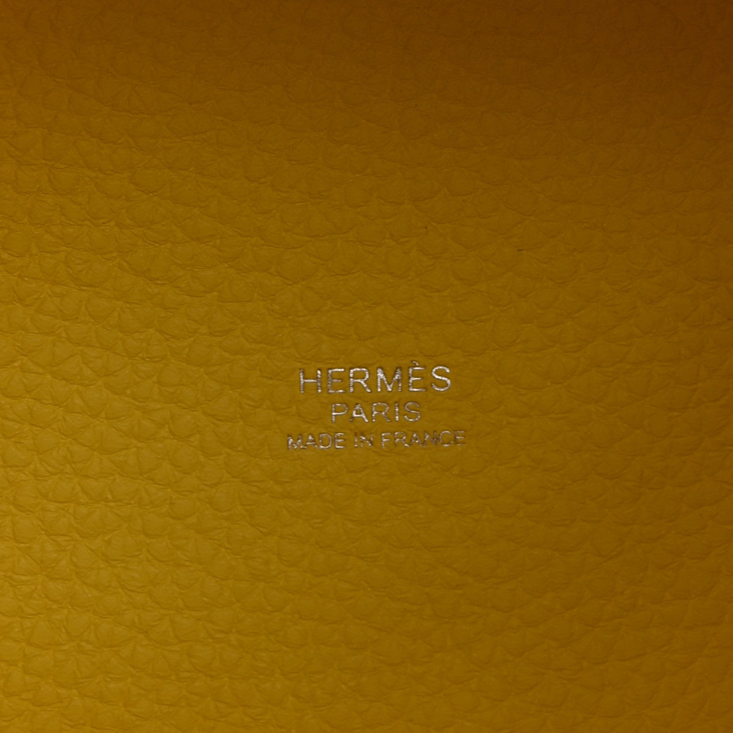 Hermes Paris stamp and Made in France on lime leather