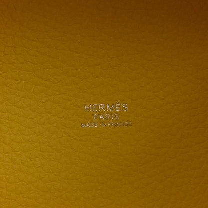 Hermes Paris stamp and Made in France on lime leather