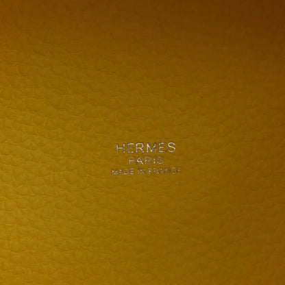 Hermes Paris stamp and Made in France on lime leather