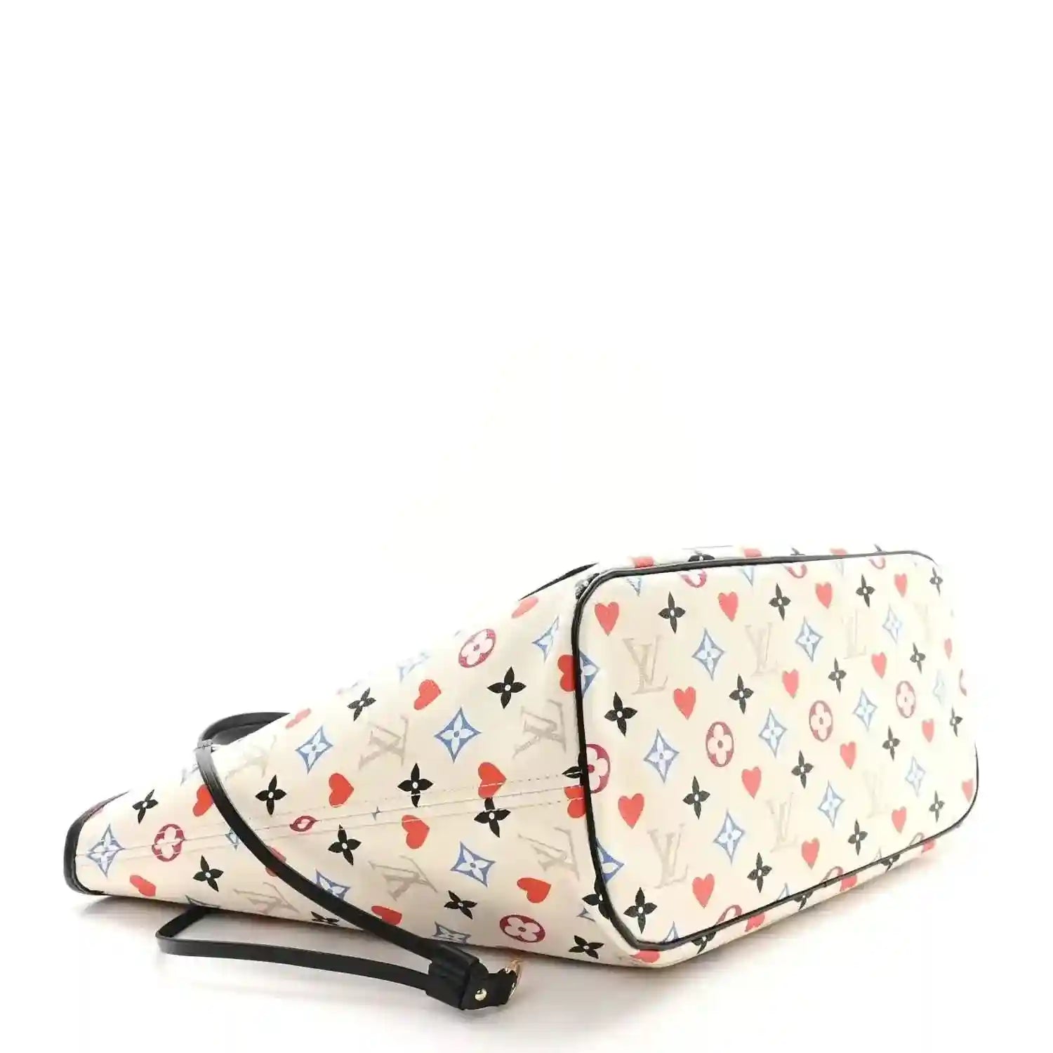 White monogram tote with matching pouch, black strap, and multicolor heart print