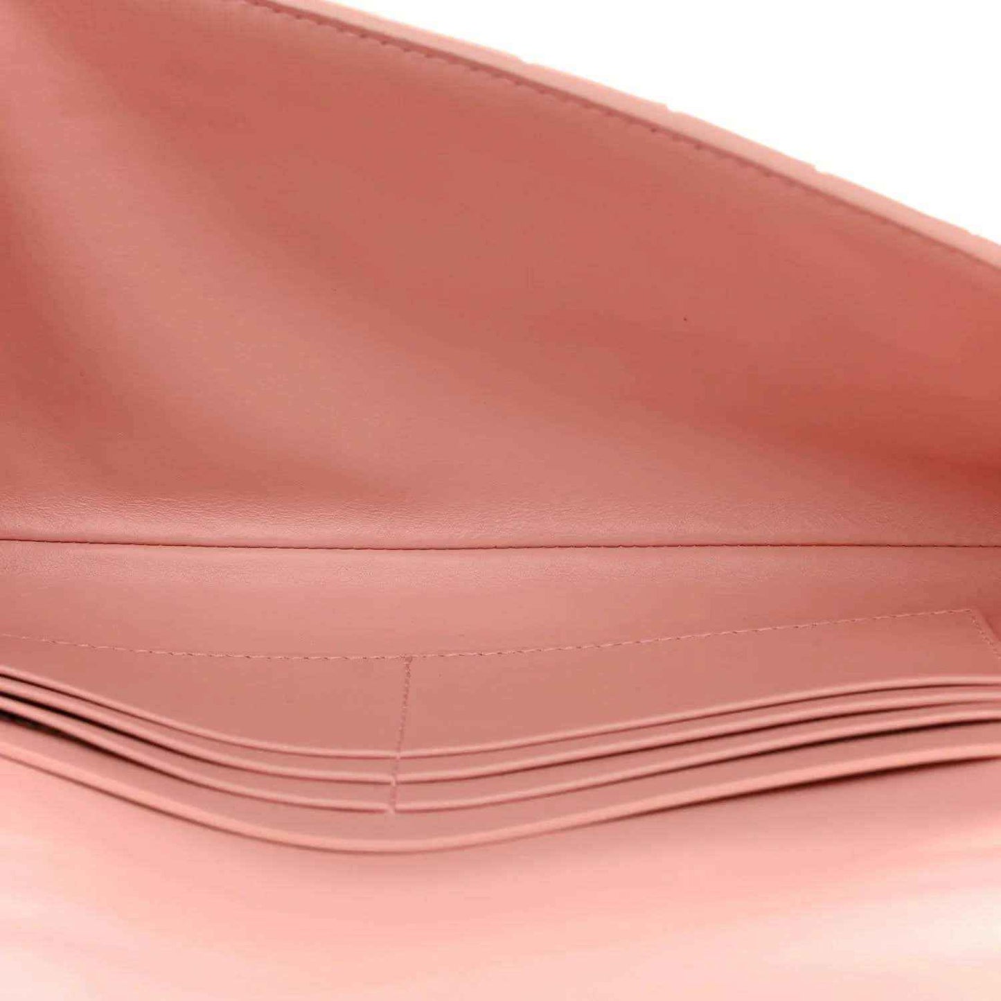 Bottega Veneta rose Nappa clutch interior with stitched edge and folded lining
