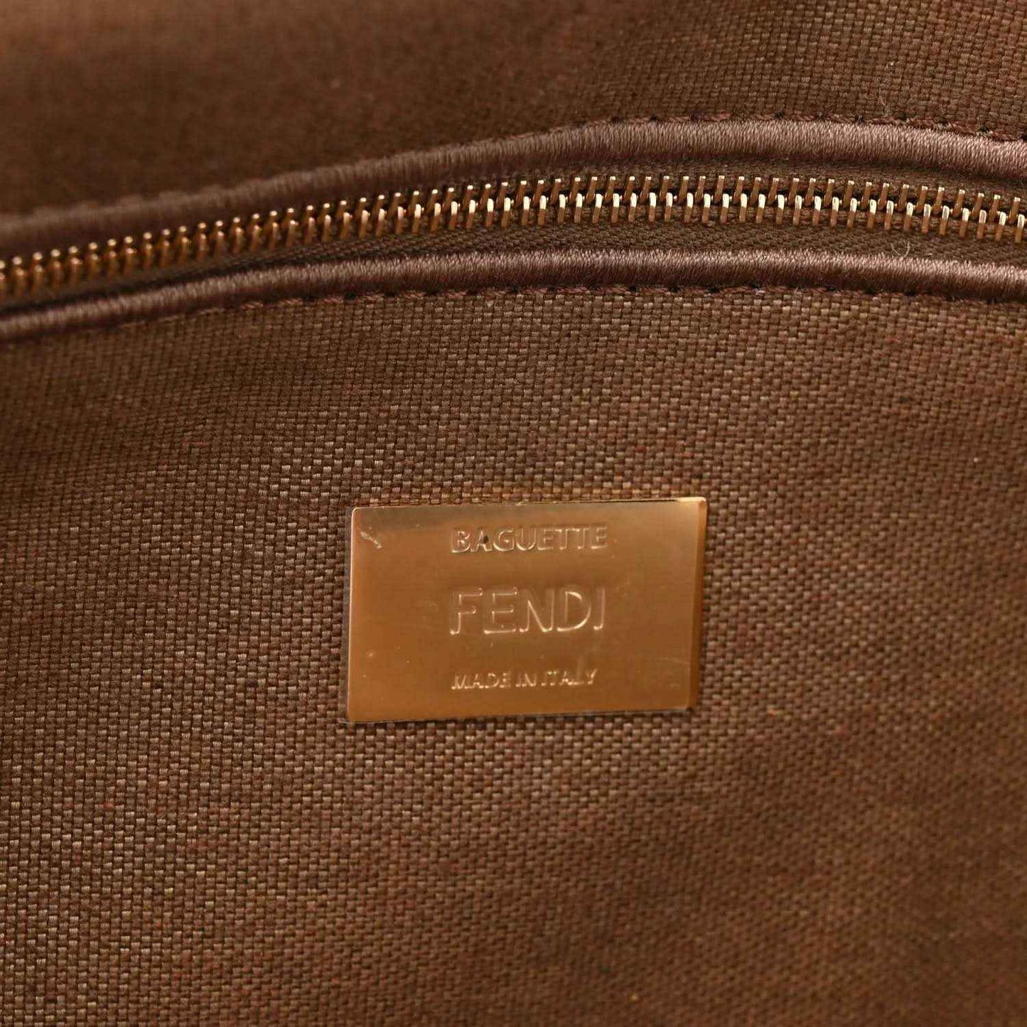 Fendi baguette shoulder bag inside view with zipper and embossed FENDI label