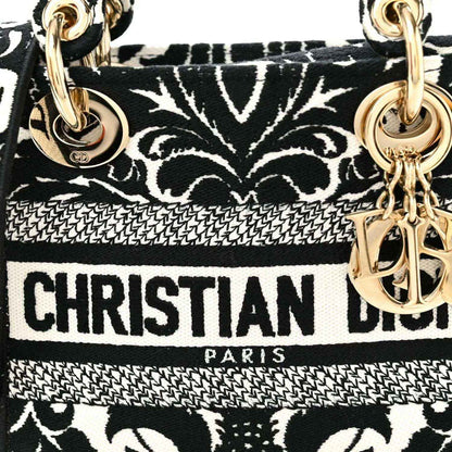 Mini embroidered canvas bag with CHRISTIAN DIOR PARIS lettering and gold-tone double handles