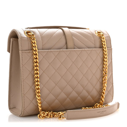 Dark beige quilted satchel with front flap, gold chain strap, and YSL logo