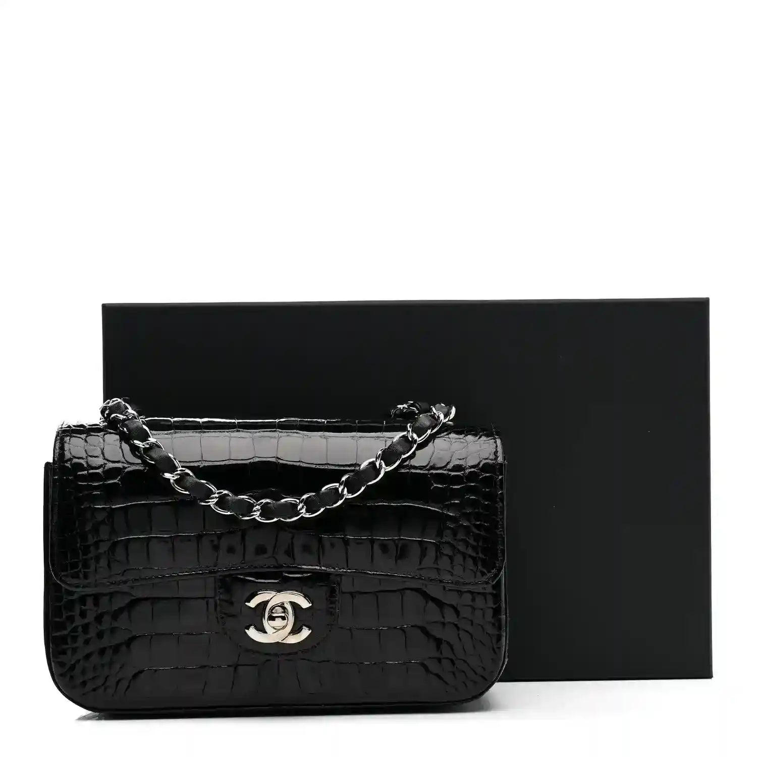 Chanel mini rectangular flap bag in shiny black alligator with chain strap and CC clasp