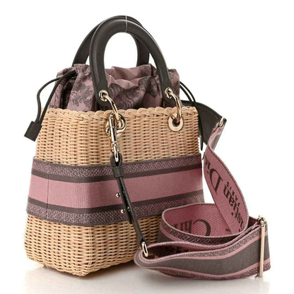 Medium wicker Lady Dior bag with pink and gray stripes, chain strap and charms