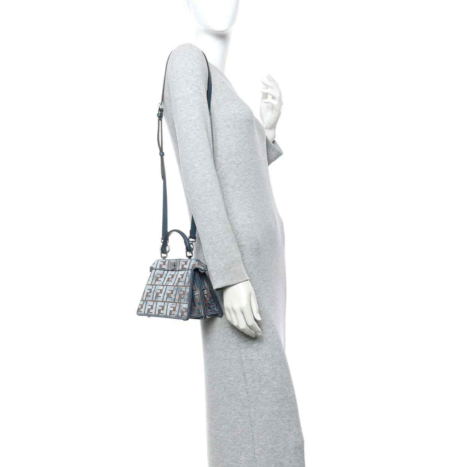 Small jacquard satchel worn crossbody, blue velvet with tan FF pattern and shoulder strap
