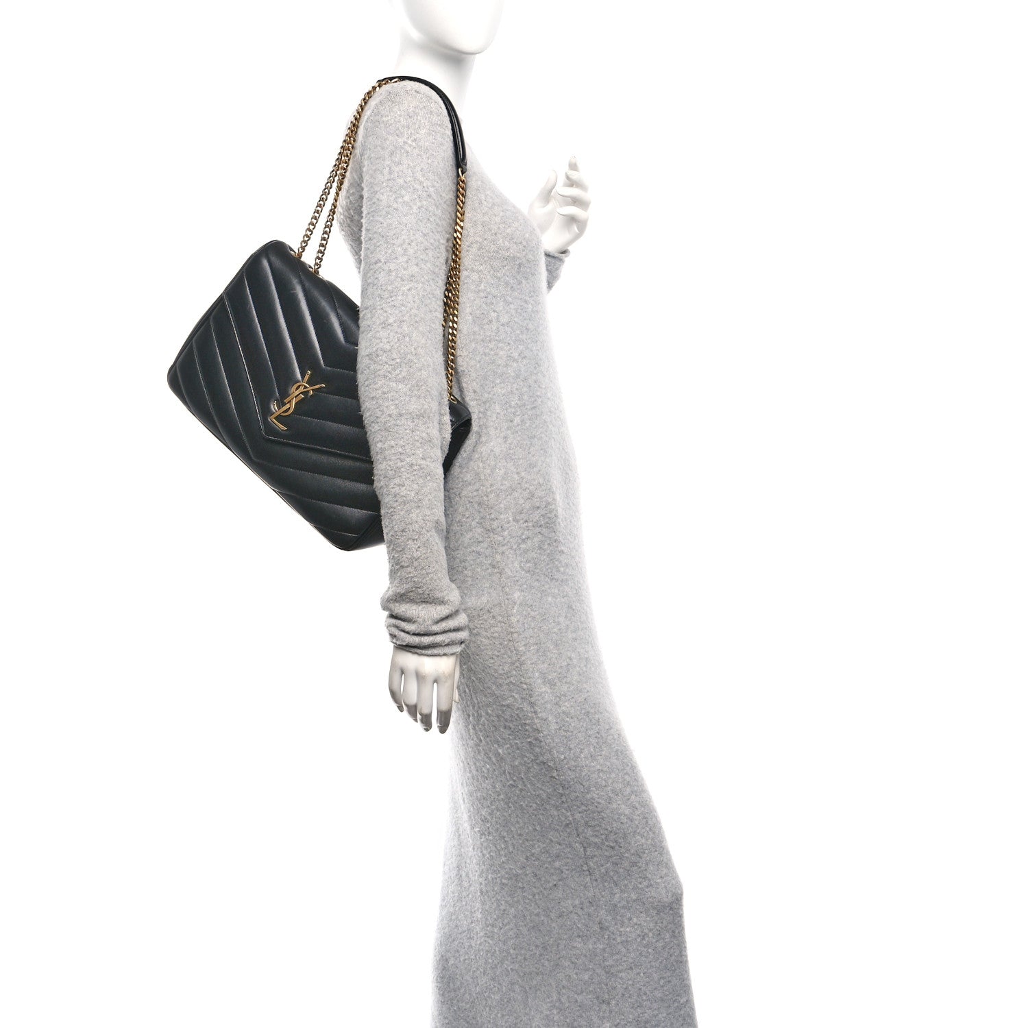 Black chevron-quilted lambskin shoulder bag with gold chain strap and flap closure