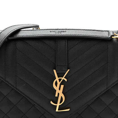 Black quilted satchel bag with gold YSL logo and top handle hardware