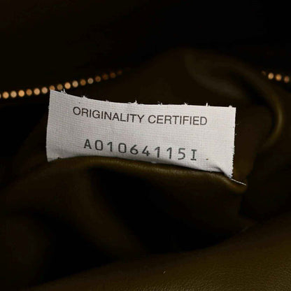 Bottega Veneta suede hobo bag, authenticity tag and stitched lining