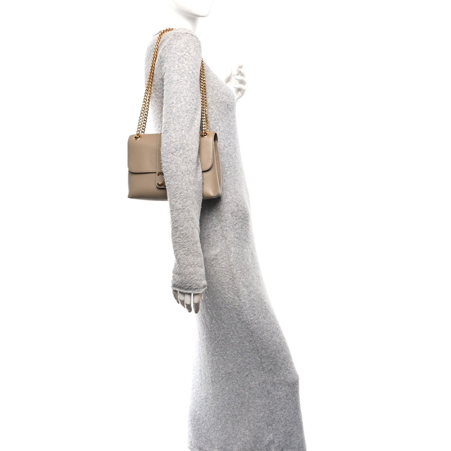 Celine tan Victoire medium bag on mannequin with gold chain strap and flap front