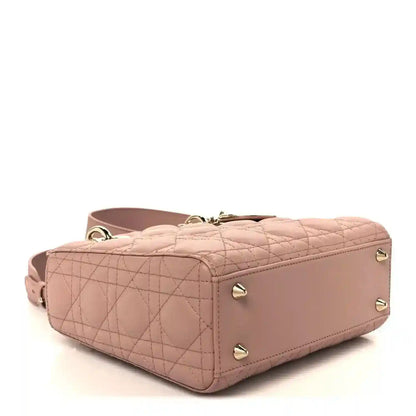 Small Lady Dior bag in blush pink quilted cannage with gold-tone feet and hardware