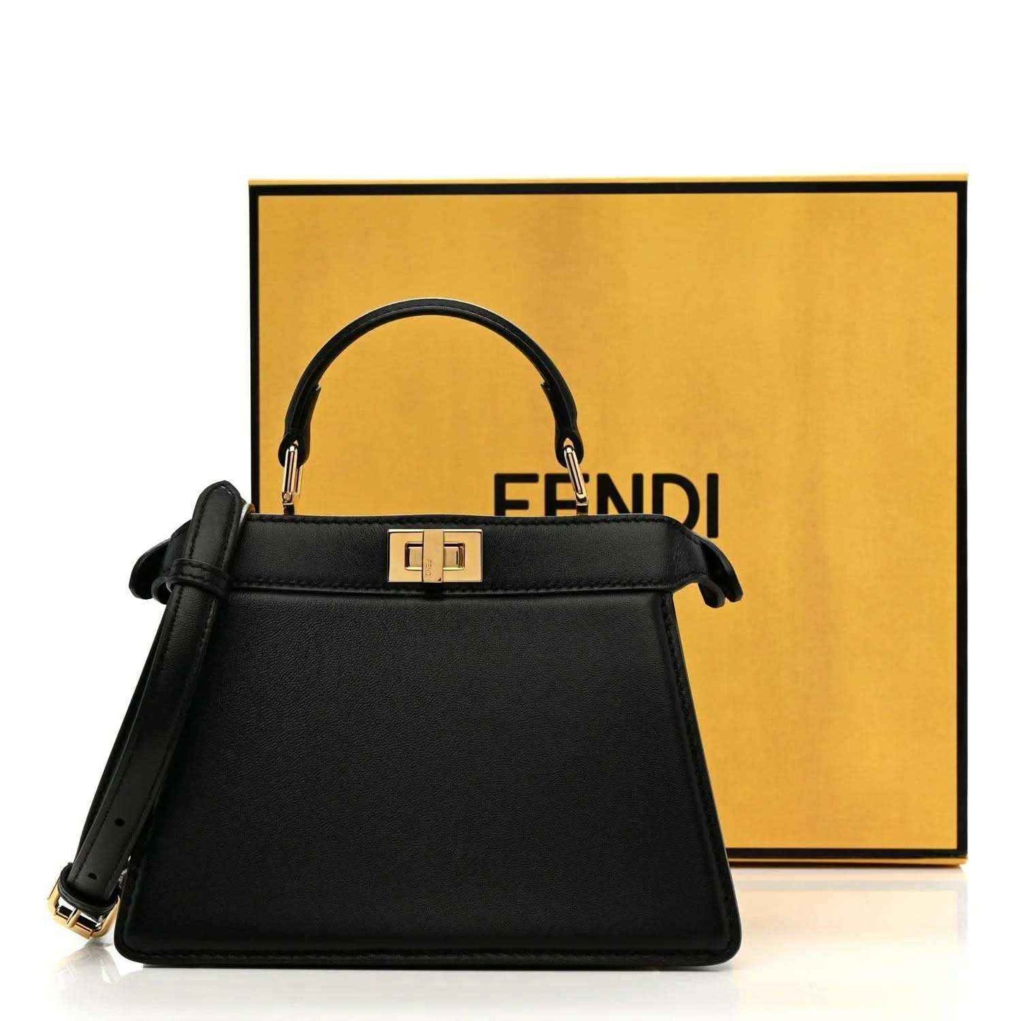 Black leather mini satchel with gold-toned clasp and top handles