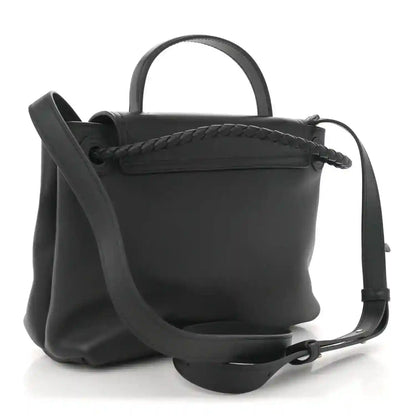 Black leather small Ciao Ciao shoulder bag with braided trim and crossbody strap.