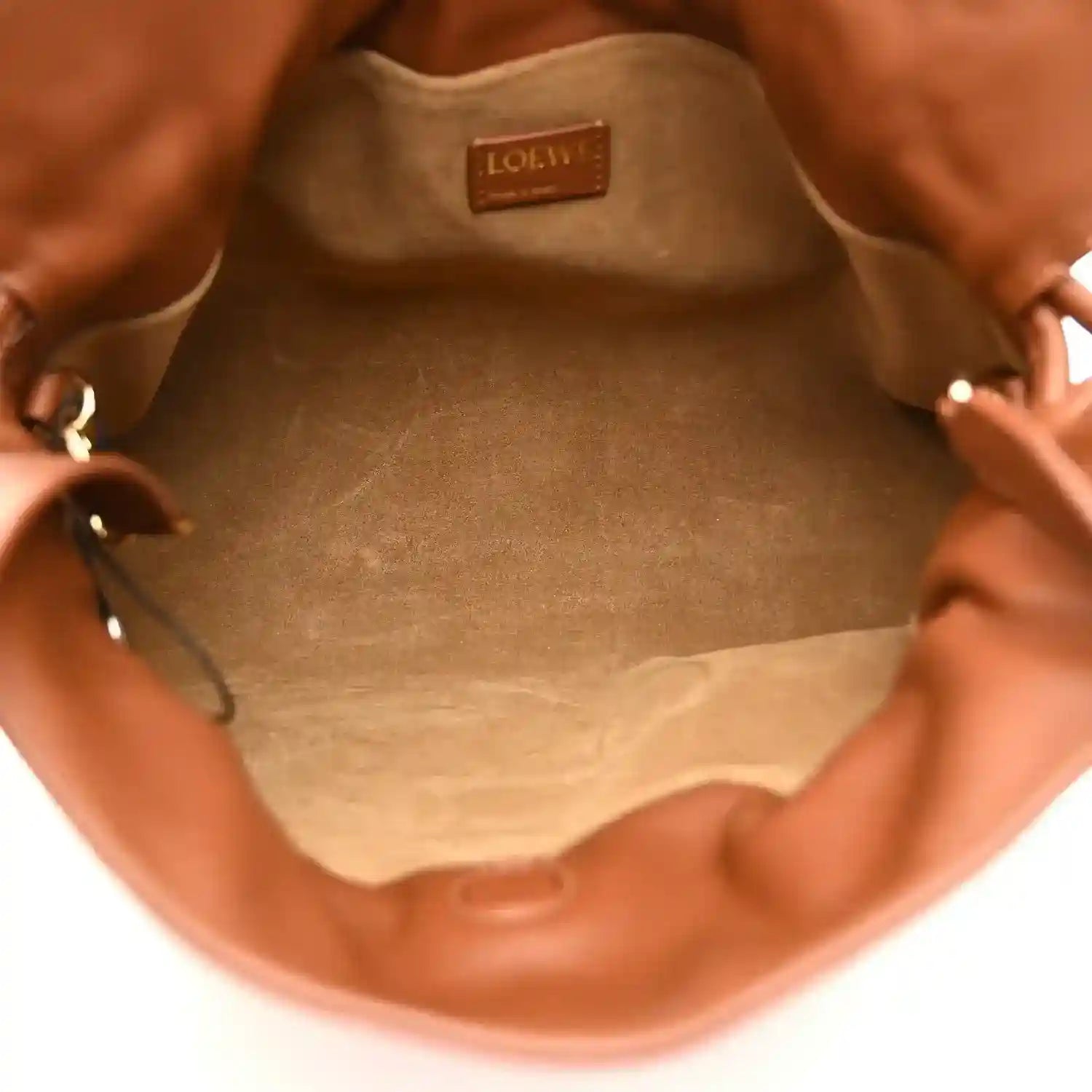 Flamenco knot clutch interior lining with Loewe leather logo patch at top