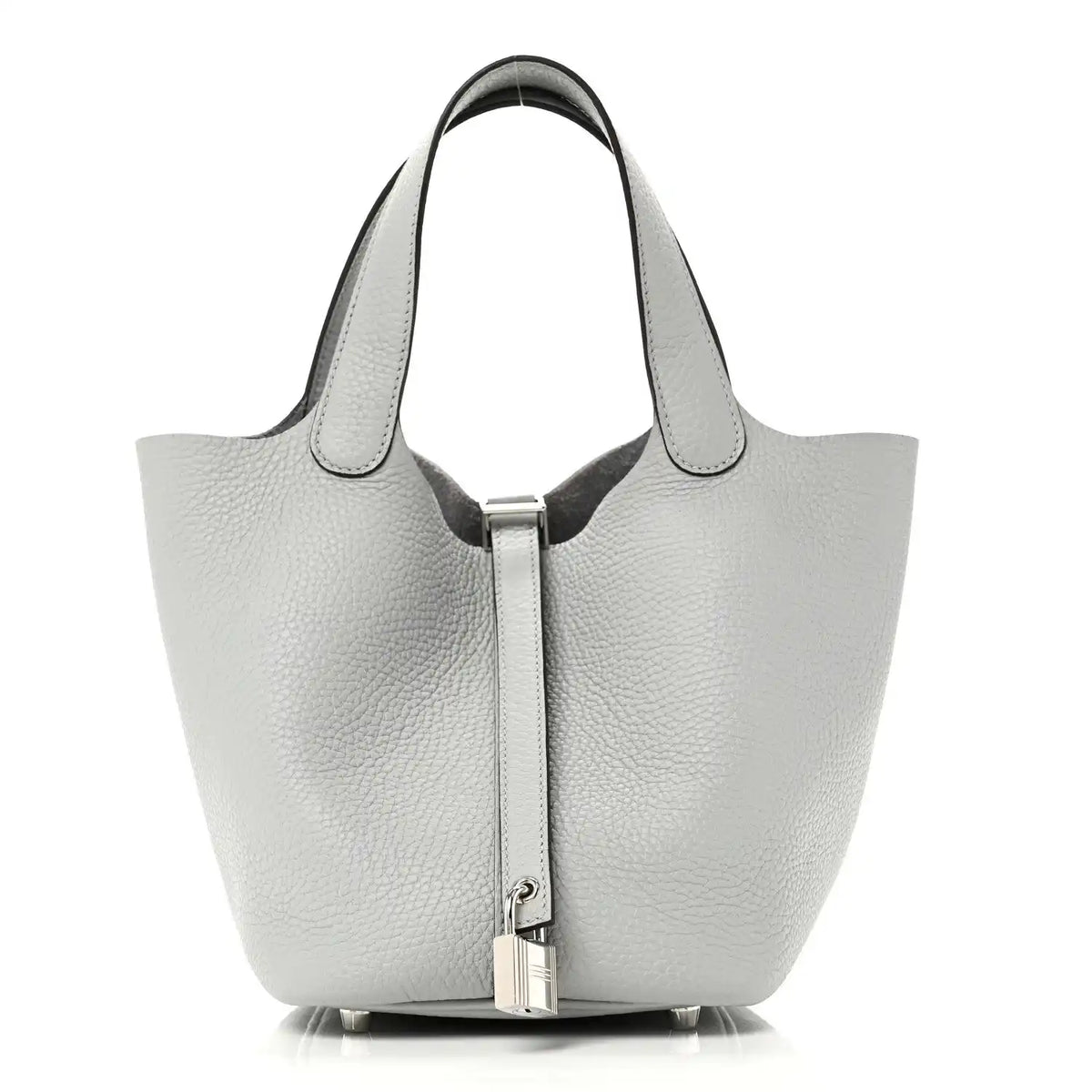 Light blue pebbled leather tote bag with top handles and front lock closure