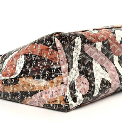 PM tote bag bottom corner close-up with dark monogram fabric and multicolor letter print
