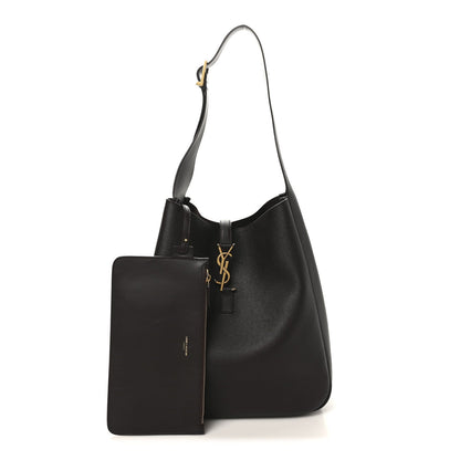 Large soft hobo bag in dark leather with front pocket and gold logo pull
