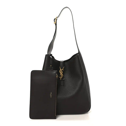 Large soft hobo bag in dark leather with front pocket and gold logo pull