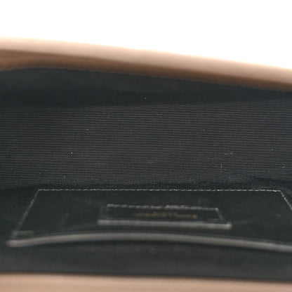 Textured satchel interior pocket with card slot, dark lining