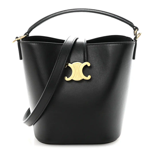 Small black Celine bucket bag with smooth finish, gold Triomphe logo, top handles