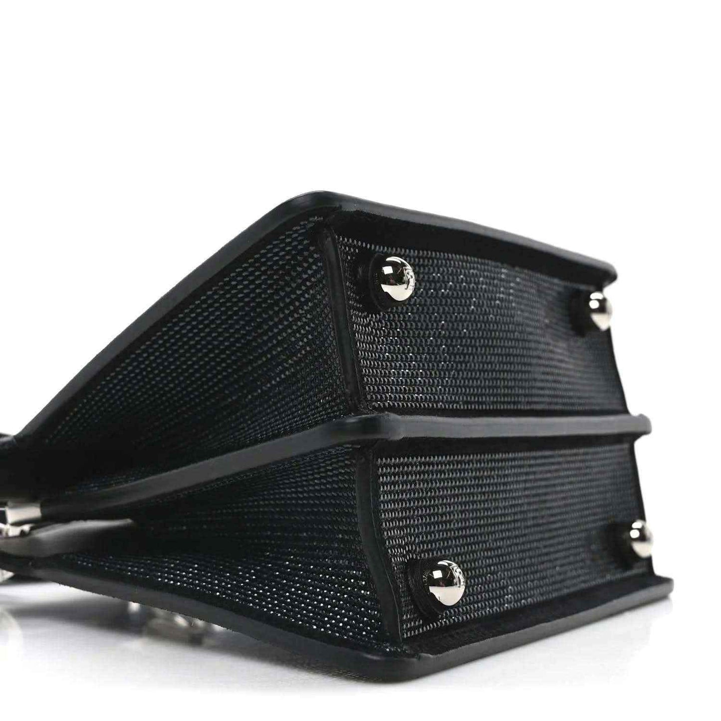 Black crystal satchel with leather back panel and hardware buttons