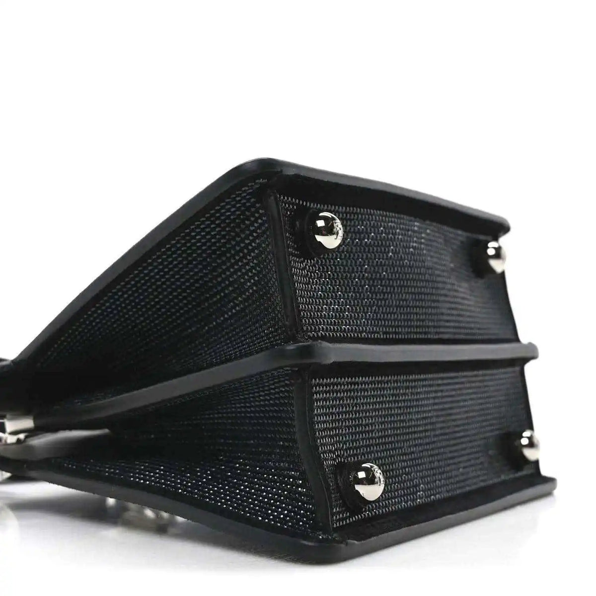 Black crystal satchel with leather back panel and hardware buttons