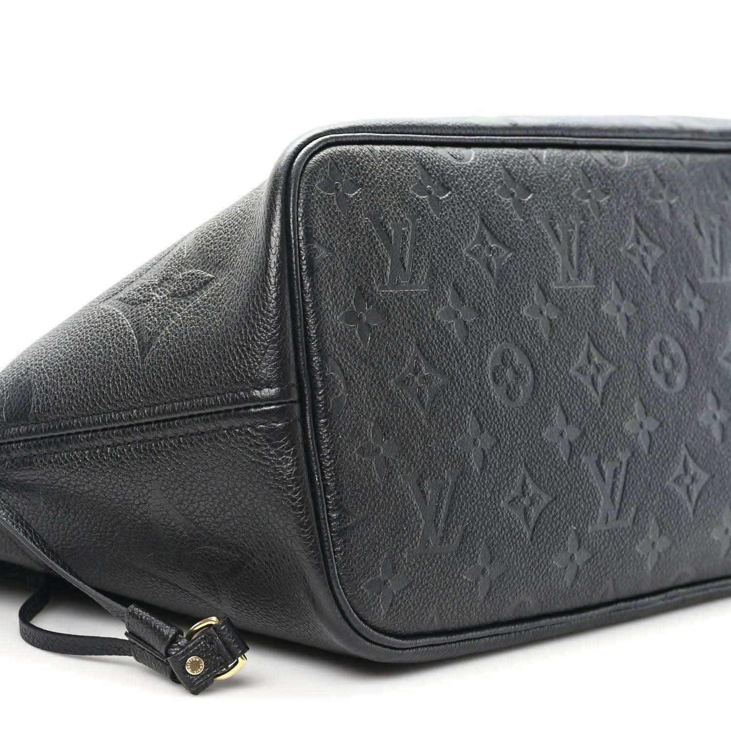Neverfull MM tote bag, dark black embossed monogram leather, side view with strap buckle