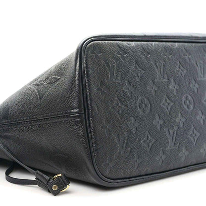 Neverfull MM tote bag, dark black embossed monogram leather, side view with strap buckle