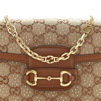 Mini shoulder bag front with GG monogram canvas, horsebit-style clasp, and gold chain