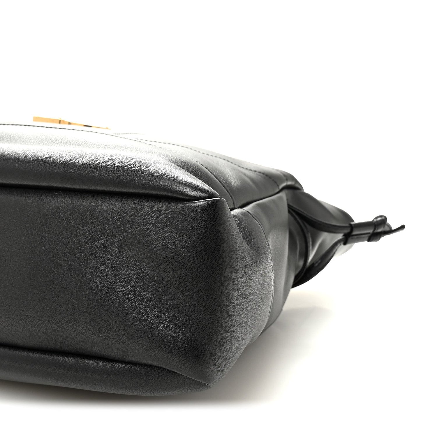 Black lambskin tote corner with drawstring bow ties and smooth rounded edge.