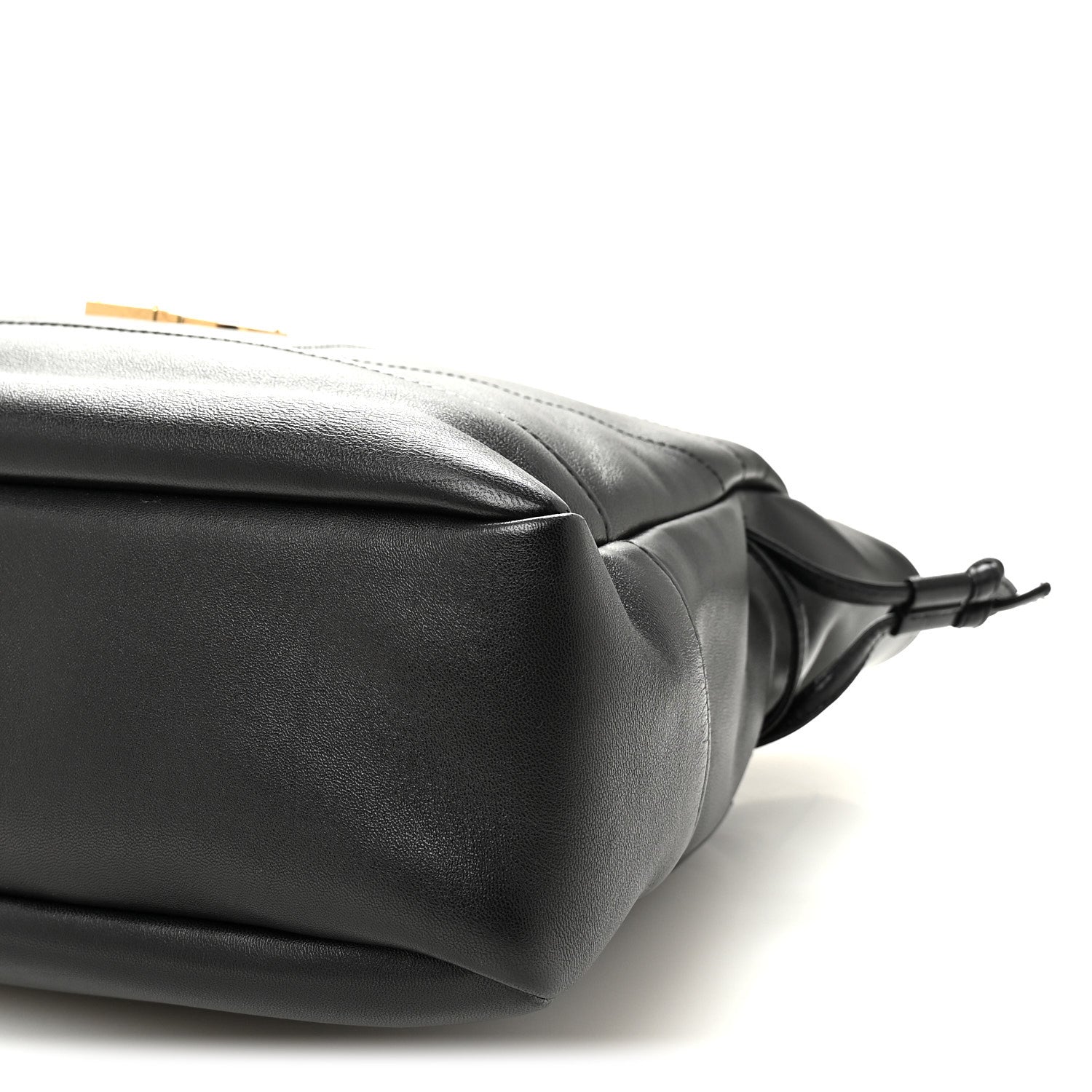 Black lambskin tote corner with drawstring bow ties and smooth rounded edge.