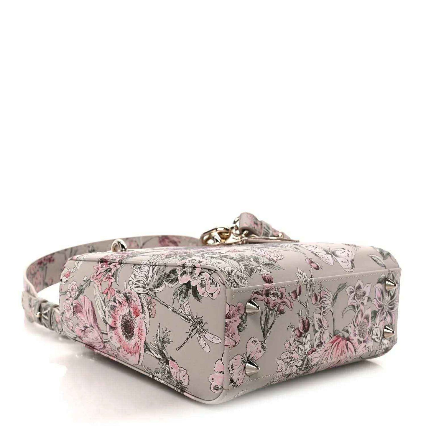 Small Lady Dior handbag base view with pink floral print and gold-tone feet