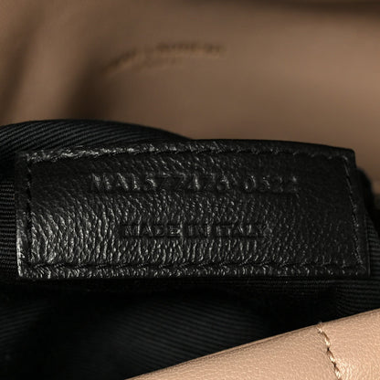 Small puffer chain satchel black label reading SAINT LAURENT PARIS