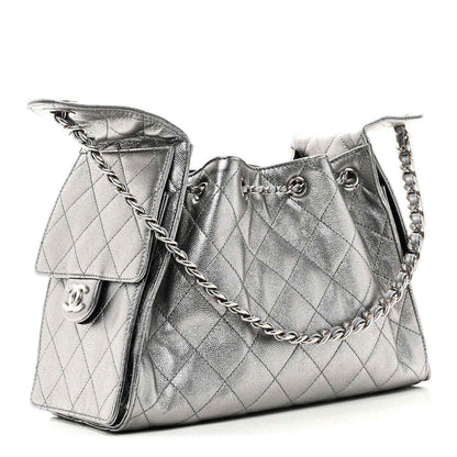 Chanel metallic quilted caviar handbag with chain shoulder strap and side flap pocket