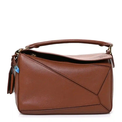 Small Puzzle bag in pecan brown leather with top handle and gold-tone hardware