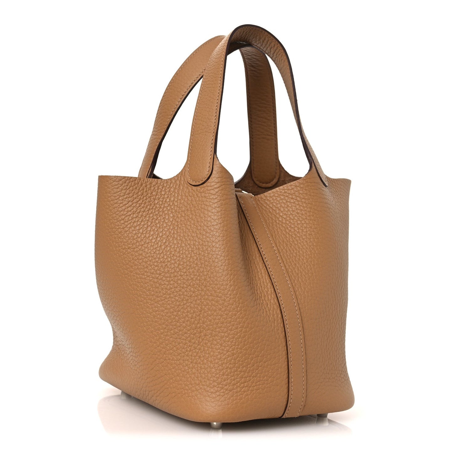 Tan textured leather tote bag with top handles and front lock clasp, side view.