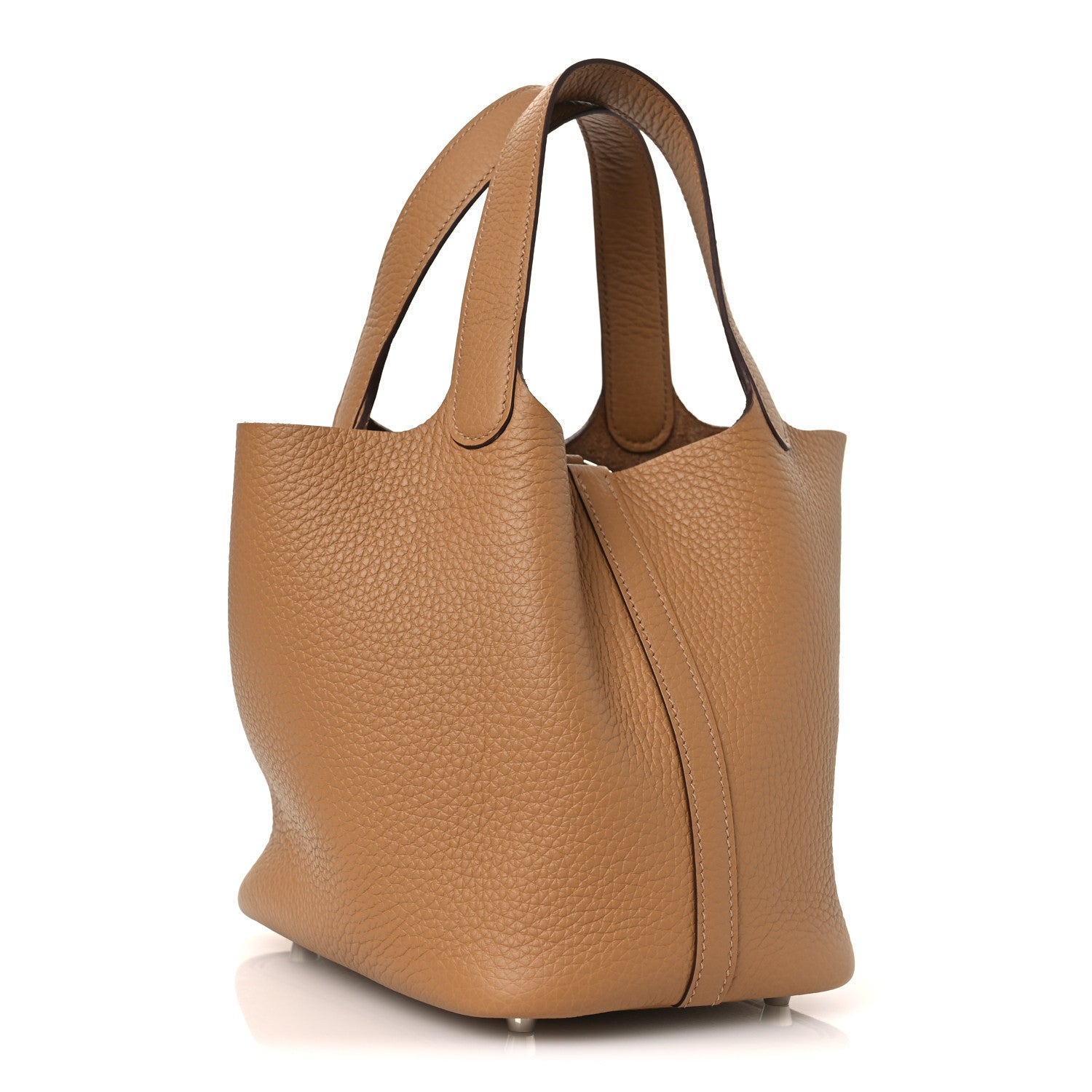 Tan textured leather tote bag with top handles and front lock clasp, side view.