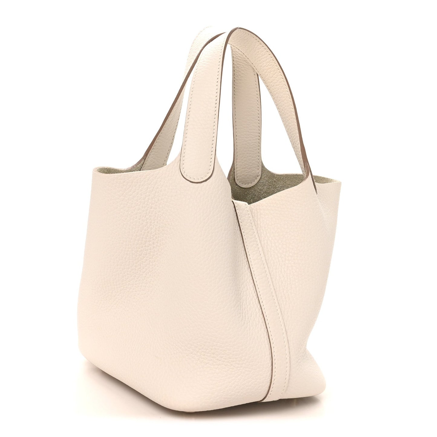 Pale cream leather tote bag with structured silhouette and front seam, angled view