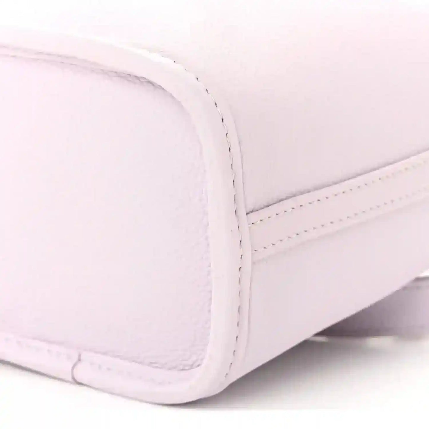 Lilac BB bag side panel with curved seam and stitched leather trim