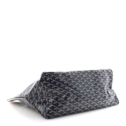 Navy patterned tote bag with structured shape and repeating Goyard logo motif.