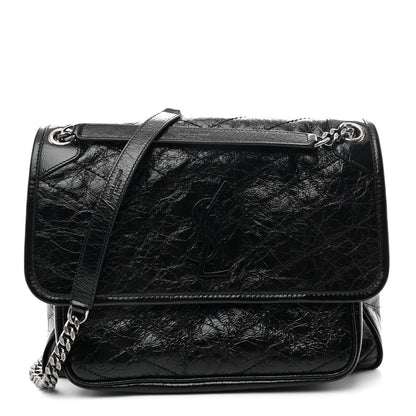Black medium chain satchel with front flap, YSL emblem, and double strap