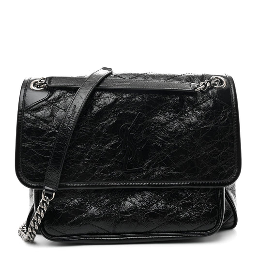 Black medium chain satchel with front flap, YSL emblem, and double strap
