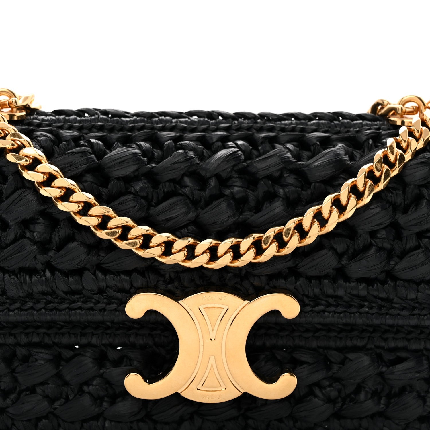 Close-up of gold chain and black woven flap with CC logo