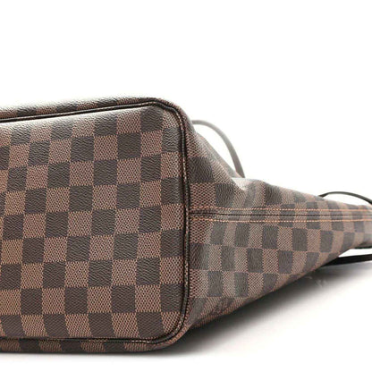 Damier Ebene tote end with brown checkered canvas, leather piping, and strap ring