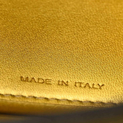 Gold leather lining with “MADE IN ITALY” stamped text and stitched border