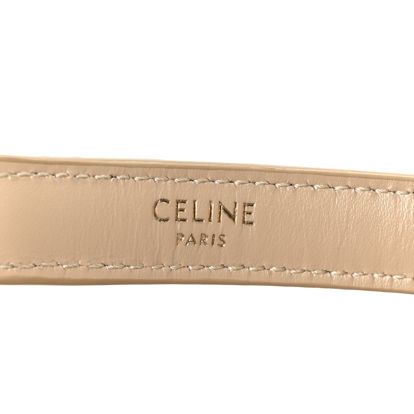 Celine Paris logo on beige leather strap with contrast stitching