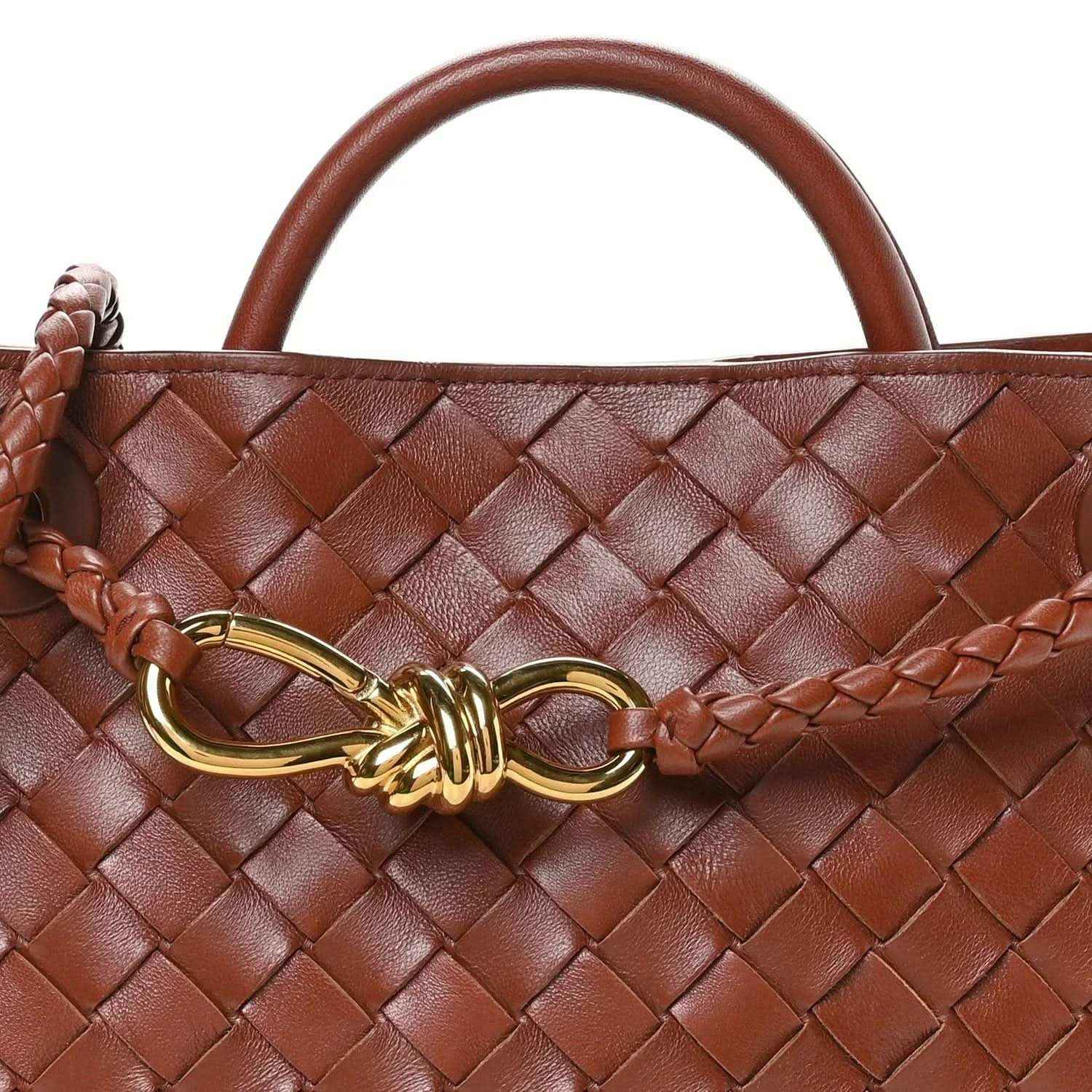 Small woven leather bag in Sapele brown with gold clasp at the top edge