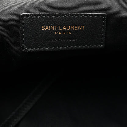 Black leather brand patch reading SAINT LAURENT PARIS on tote lining.