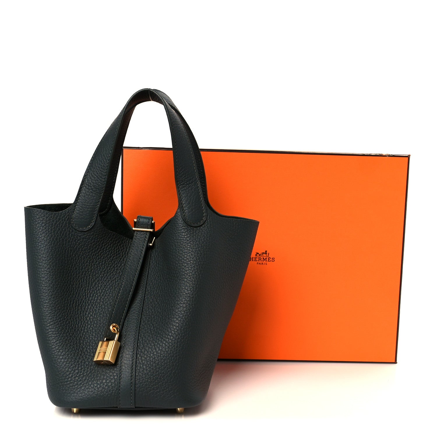Dark green leather tote with gold-tone lock charm and adjustable strap